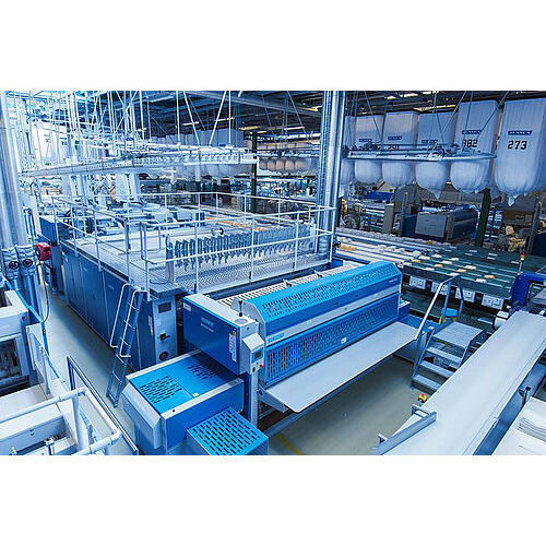 Sistema de túneles de lavado automático con escaner, prensas, Secadoras de Transferencia y Calandra JENSEN